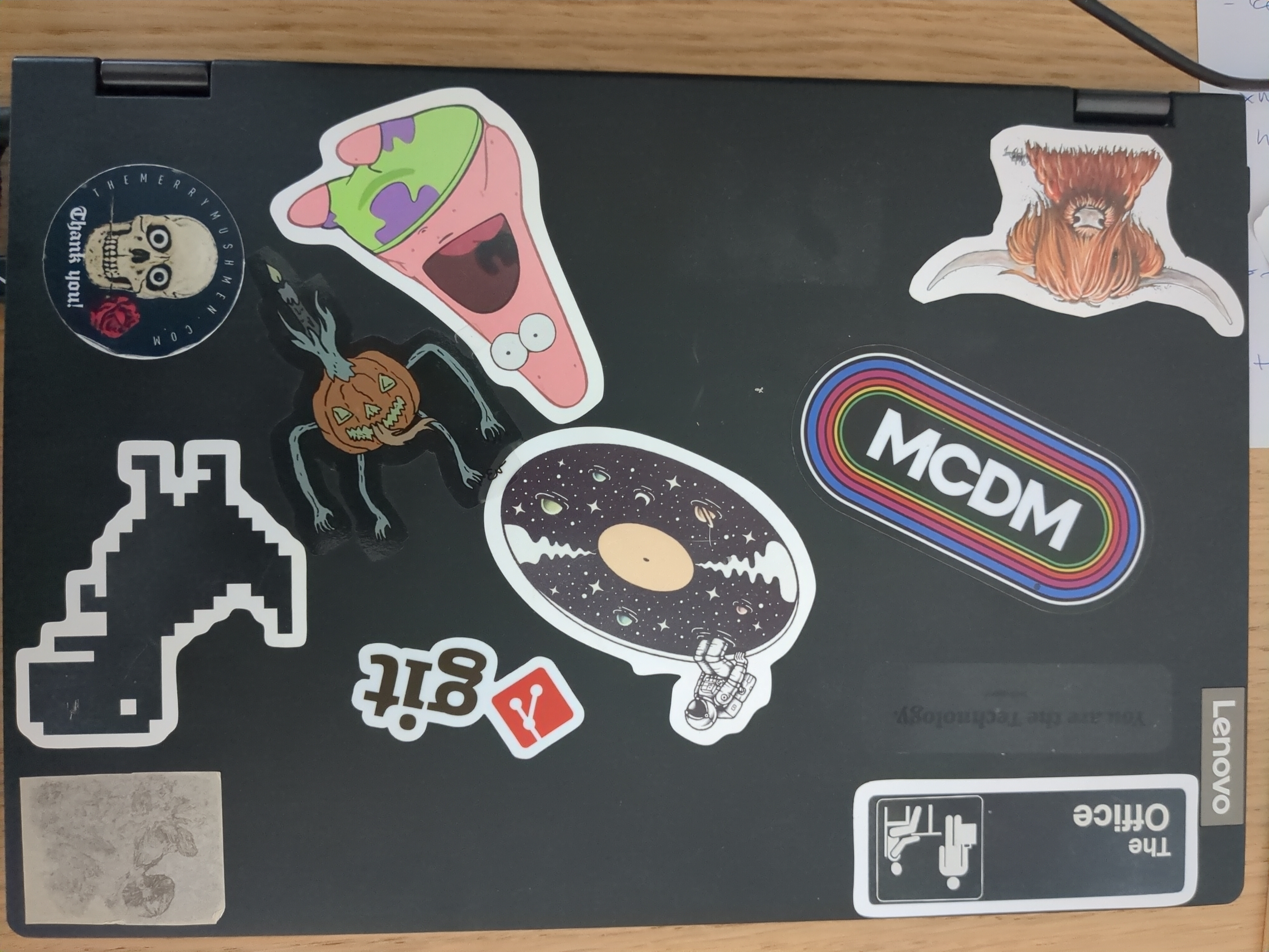 My old laptop's lid covered with various stickers My laptop with stickers